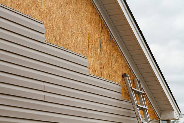Professional Siding Installation technician working in Wilson, NC